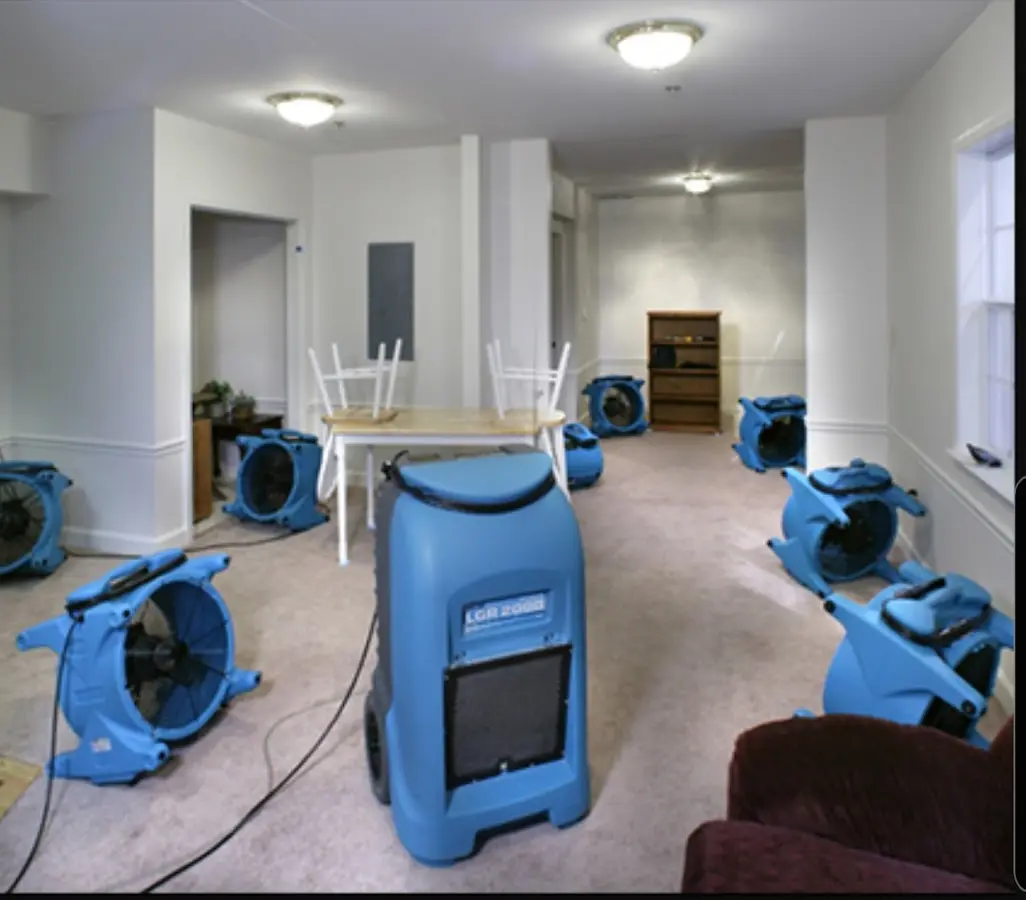 Air movers and dehumidifier setup for Water Damage Restoration in DeSoto